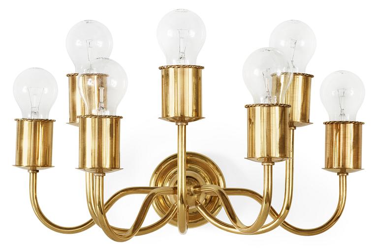 A Josef Frank brass wall lamp by Svenskt Tenn, variety of model 2572.