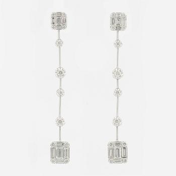 Earrings with baguette and brilliant cut diamonds.