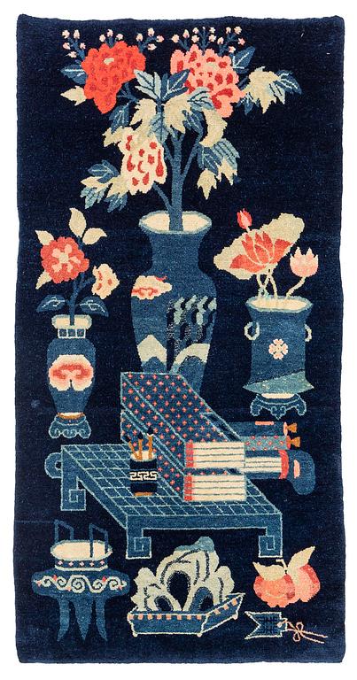 An antique Baotou rug, northern China, around 1900, c. 160x83 cm).