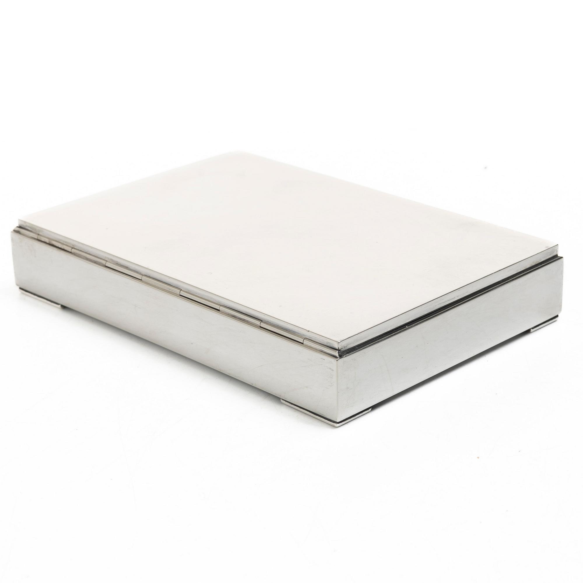 A 20th century sterling silver cigar-box.