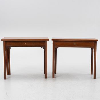A macthed pair of late Gustavian mahogany veneered card tables one by C D Fick, Stockholm 1776-1806.