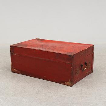 A Chinese red leather and wooden box, 20th century.