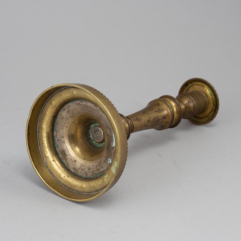 A late 18th century bronze candlestick.