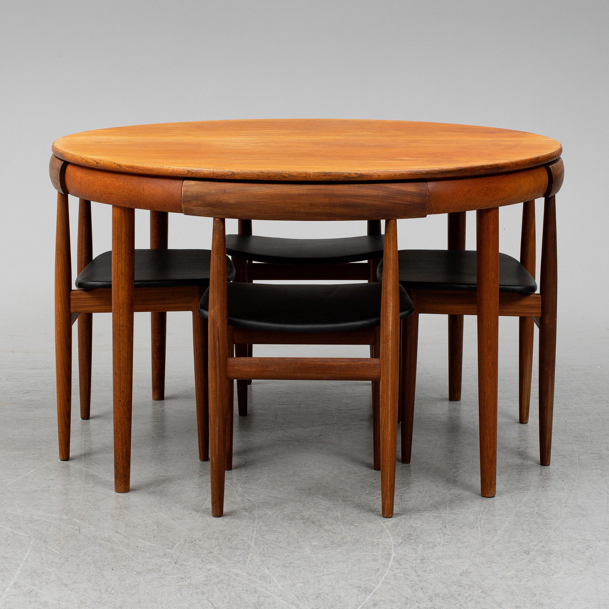 HANS OLSEN, a five-piece teak fining suite from Frem Røjle, Denmark, 1950's/60's.