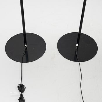 A pair of black metal floorlights, Luxus, Vittsjö.