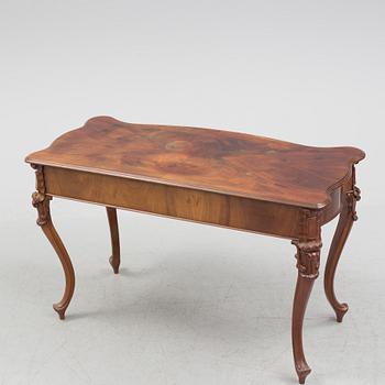 a neo rococo desk from the late 19th century.