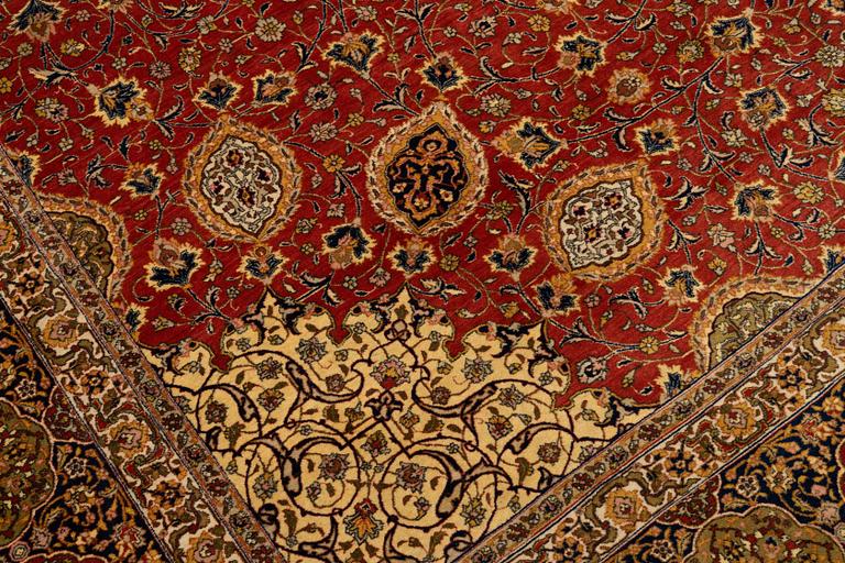 A carpet, semi-antique Tabriz, ca 398 x 290 cm.