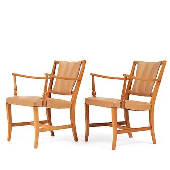 Josef Frank, a pair of mahogany easy chairs, Svenskt Tenn, Sweden 1940-1960s, model 2067.