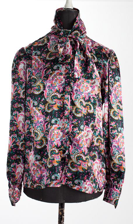 An Oscar de la Renta blouse.