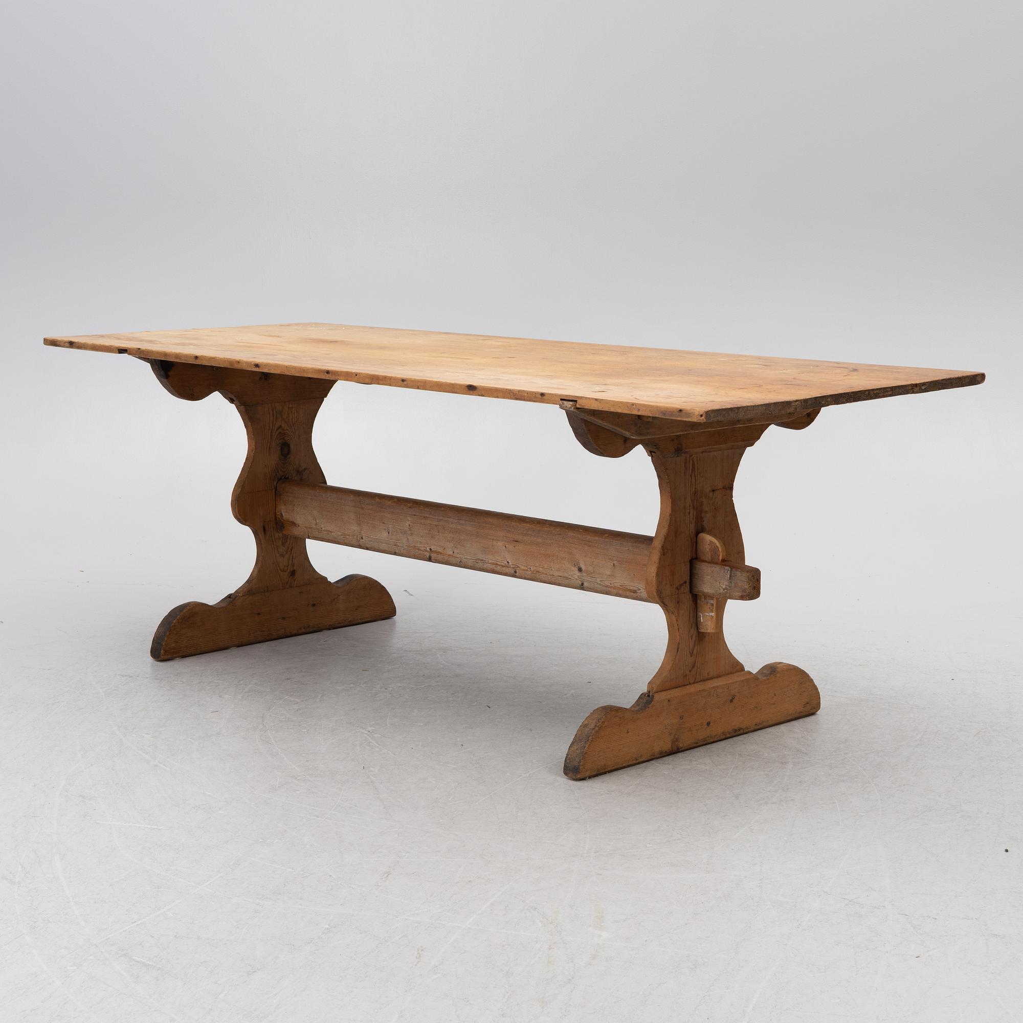 A Swedish pine trestle table, 18th / 19th century.
