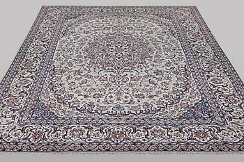 A carpet, Nain, part silk, 6 laa, ca 426 x 309 cm.