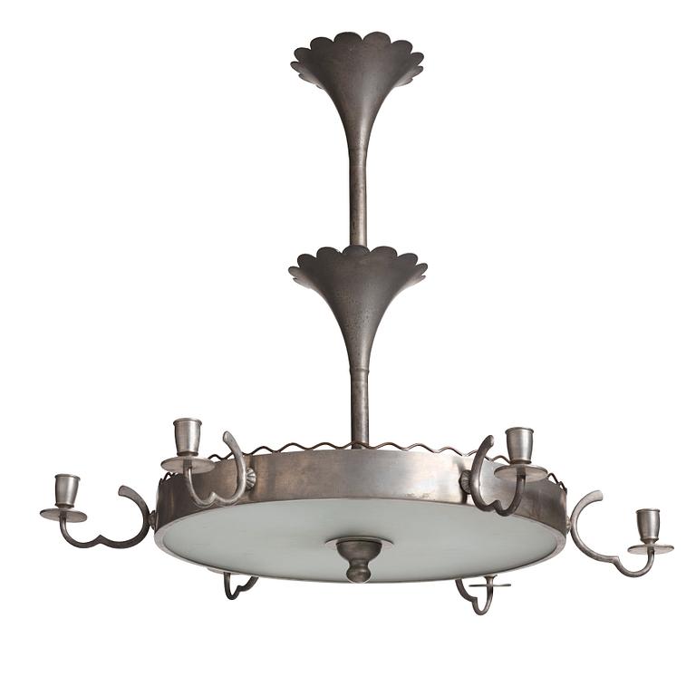 Firma Svenskt Tenn, a pewter and brass chandelier, Stockholm 1926.