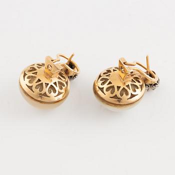 Gold and mabe pearl and brilliant cut diamond earrings.