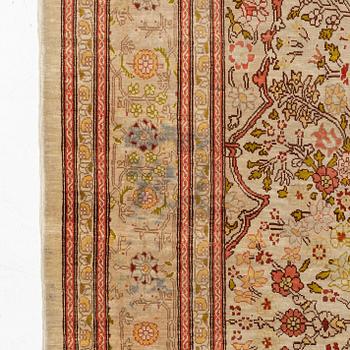 A Hereke silk rug, c. 130 x 87 cm.