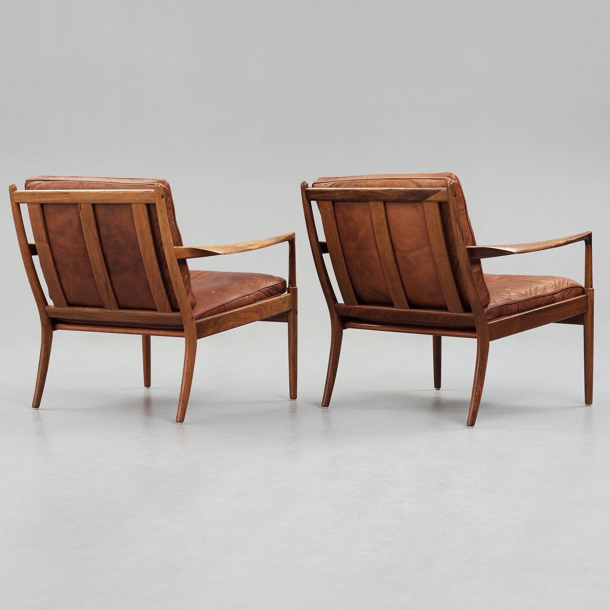 Ib Kofod-Larsen, a pair of "Samsö" palisander and brown leather easy chairs, Olof Persons Fåtöljindustri (OPE) Sweden 1960's.