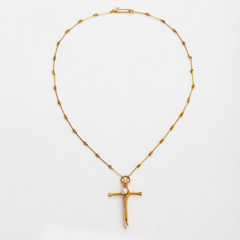 Christophe Burger, "Gold bless", a 14K gold necklace with a cultured pearl. Lapponia 2003.