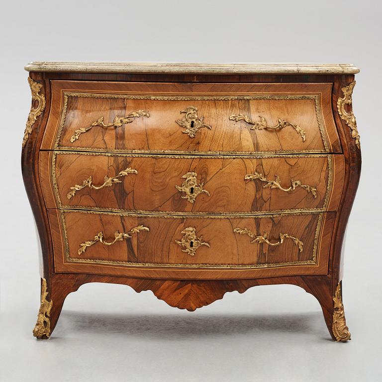 A rococo ormolu-mounted and parquetry commode attributed to C. G. Willkom (master in Stockholm 1763-65).