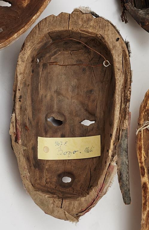 Masker, 4 st, enligt uppgift Nyanga, Kongo, Ogino, Nigeria, Songe, Kongo m.m, 1900-talets andra hälft.