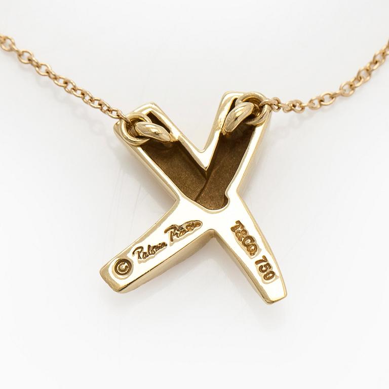 Tiffany & Co, Paloma Picasso, an 18K gold "X Kiss" necklace.