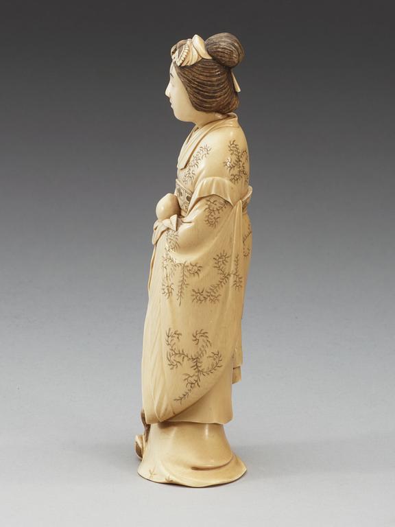 A Japanese Ivory figure of a lady, Meiji (1868-1912).