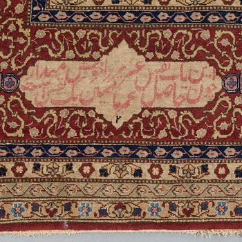 A CARPET, a semi-antique Tabriz, ca 466 x 328,5 cm.