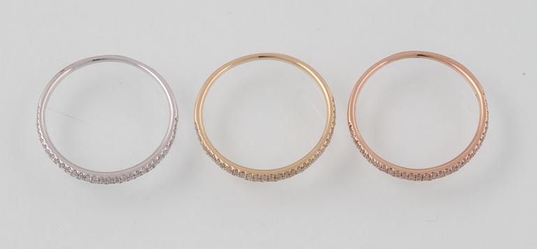 RINGAR, 3 st, 14K trefärgat guld med briljantslipade diamanter totalt ca 0.54 ct. Vikt 3,4 gram.