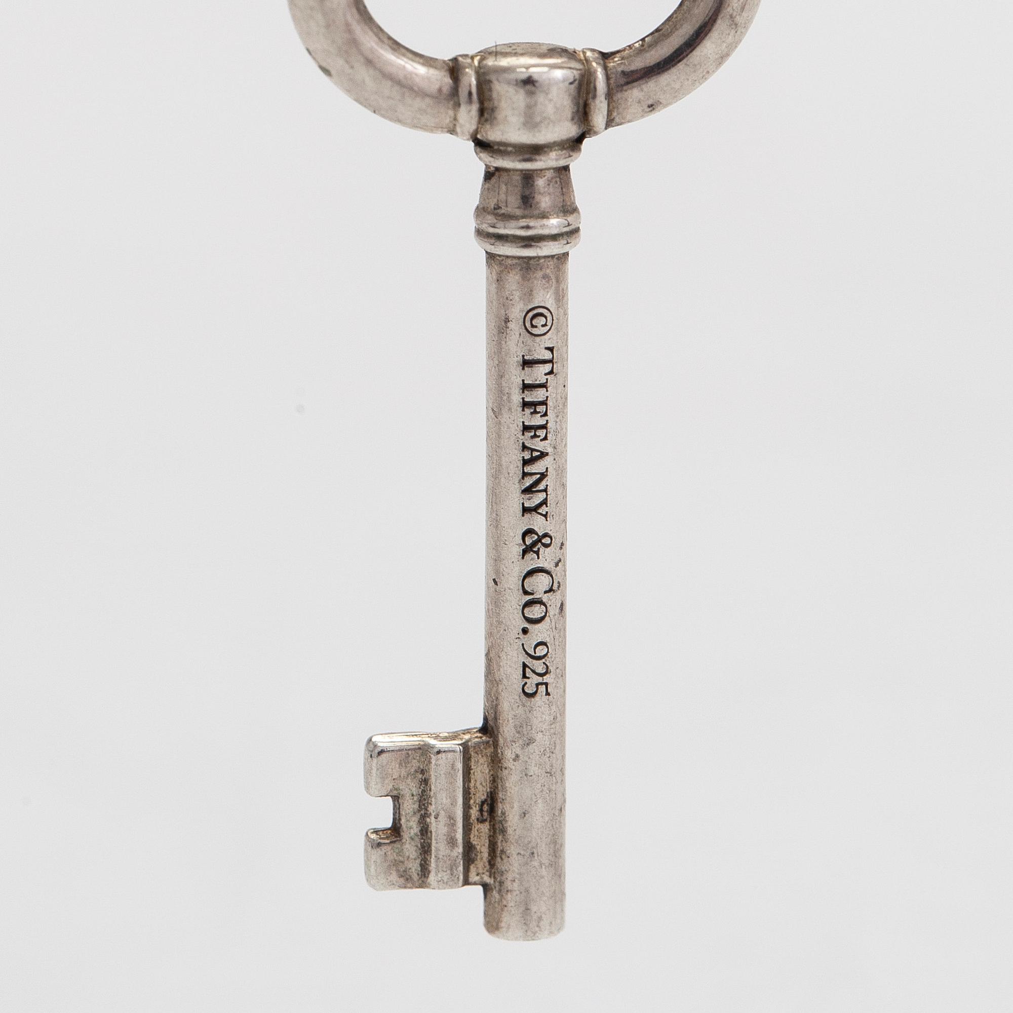 Tiffany & Co, A sterlingsilver pendant with chain.
