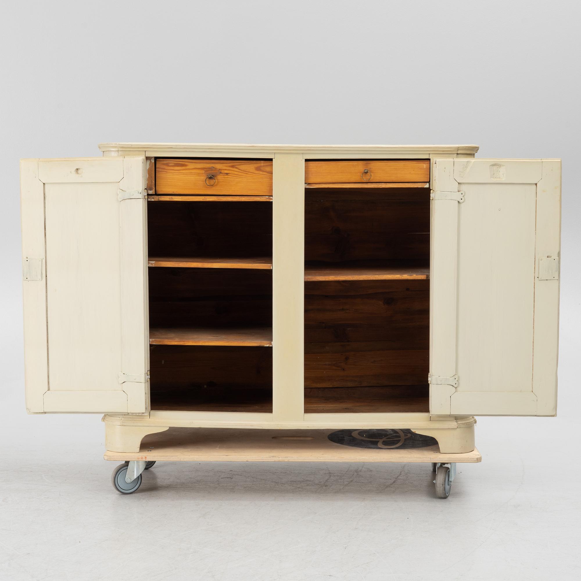 A Gustavian cupboard, early 19th century.