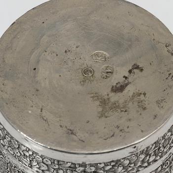 A Persian silver pitcher with five stemmed cups and a beaker, first part of the 1900s.