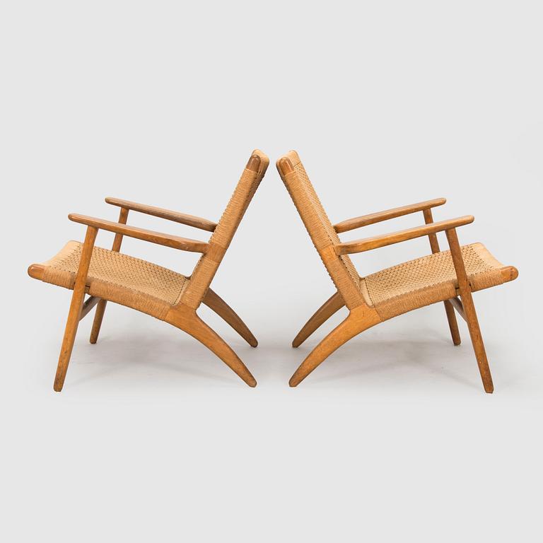 Hans J. Wegner, Armchairs, a pair, "CH25", Carl Hansen & Son, Denmark, 1960s.