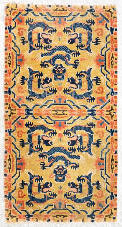 A Chinese antique Ningxia rug, late Qing dynasty, c. 128 x 67 cm.