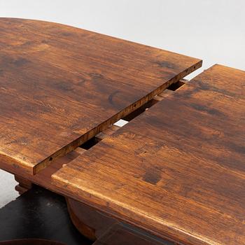 An oak dining table, Baroque early 18th century and Baroque style 19th/20th century.
