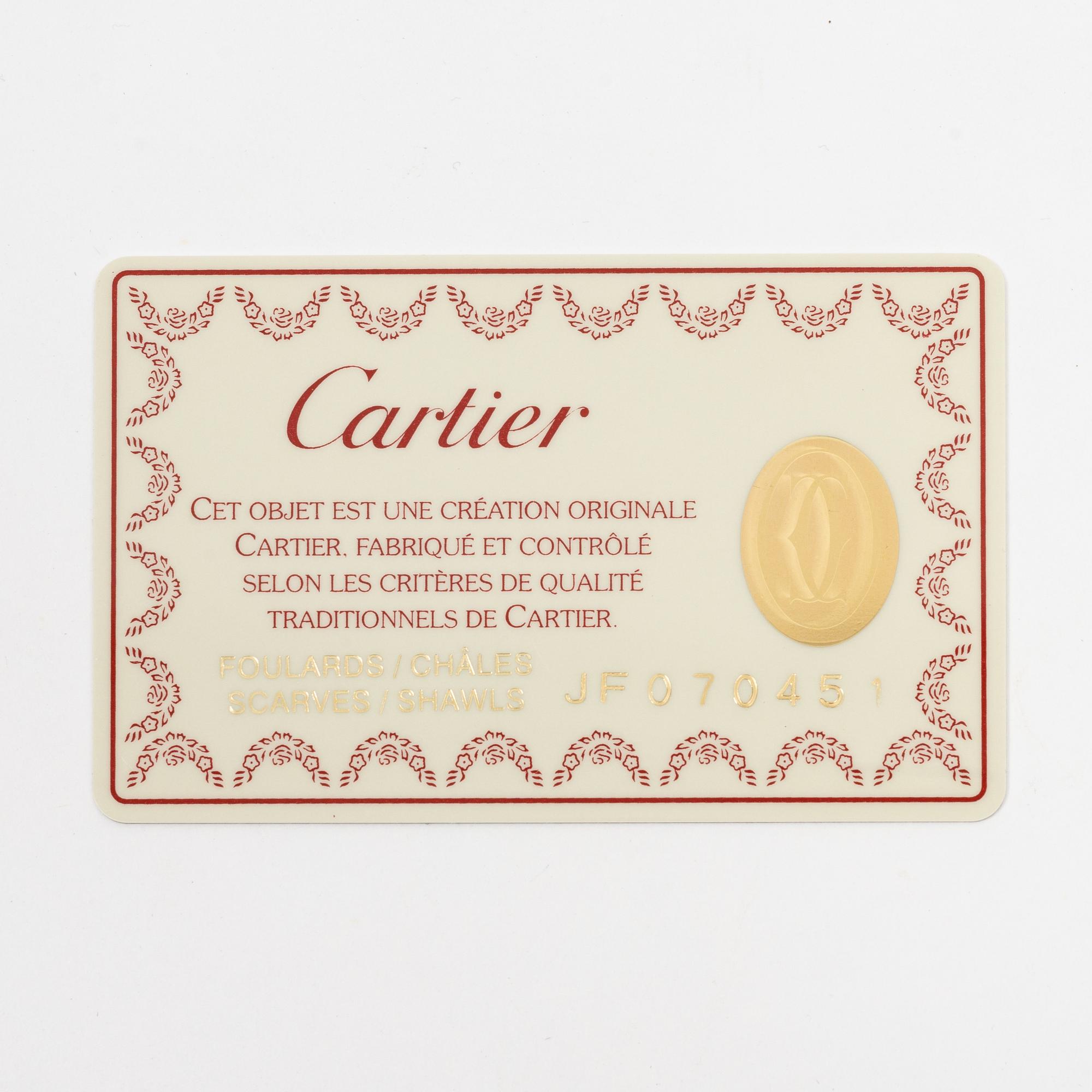 Cartier, a silk scarf.