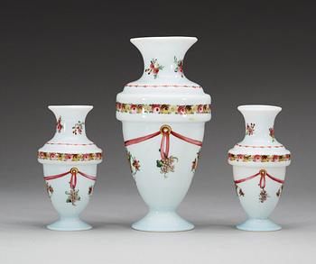A set of three opaline glass vases, 19th Century, presumably Russian.