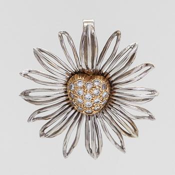 A 14K white gold flower pendant, diamonds totalling approximately 0.12 ct.