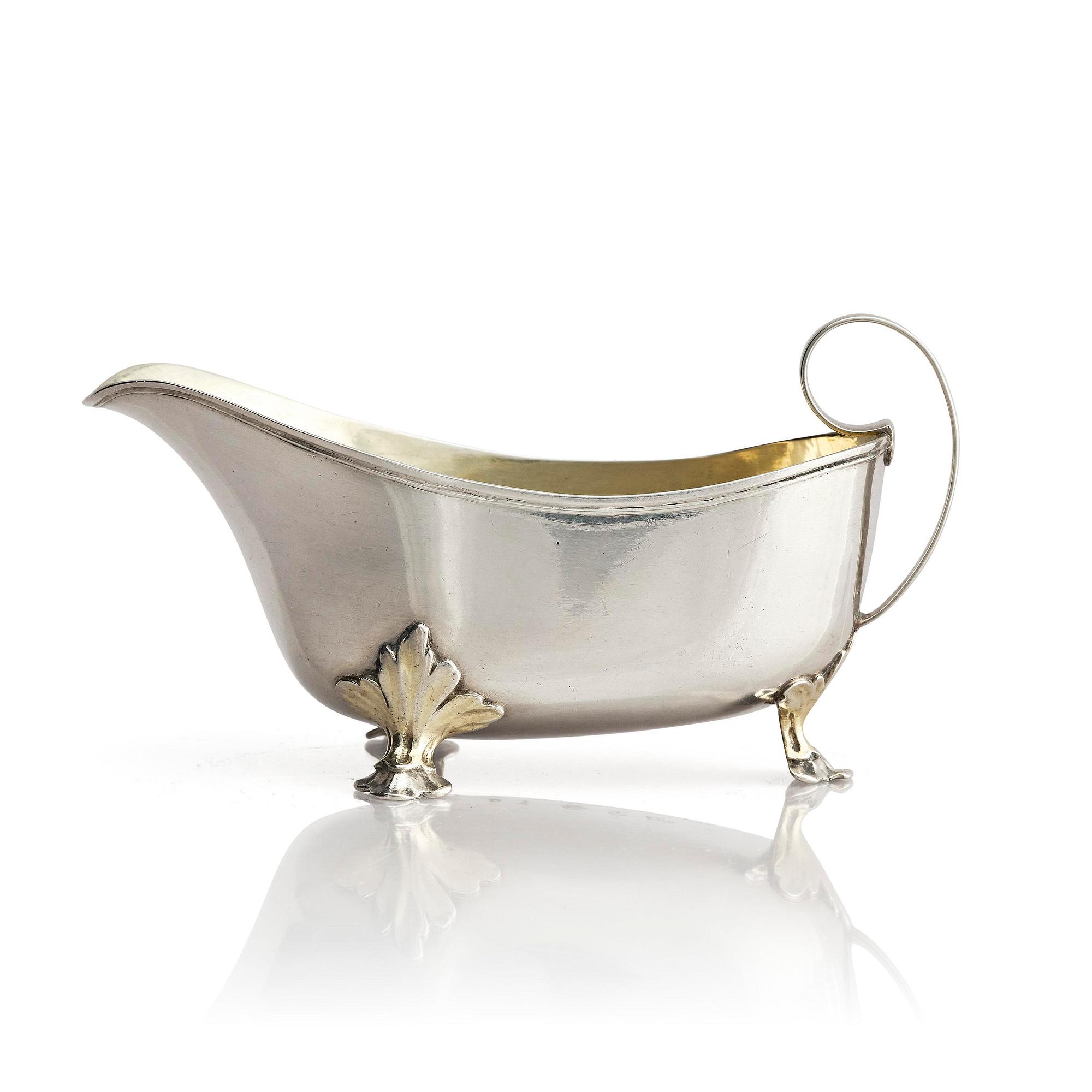 A Swedish early 19th century parcel-gilt cream-jug, mark of Johan Wasserman, Lindesberg, Sweden 1810.