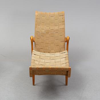 A lounge chair by Bruno Mathsson, mid 20th Century.