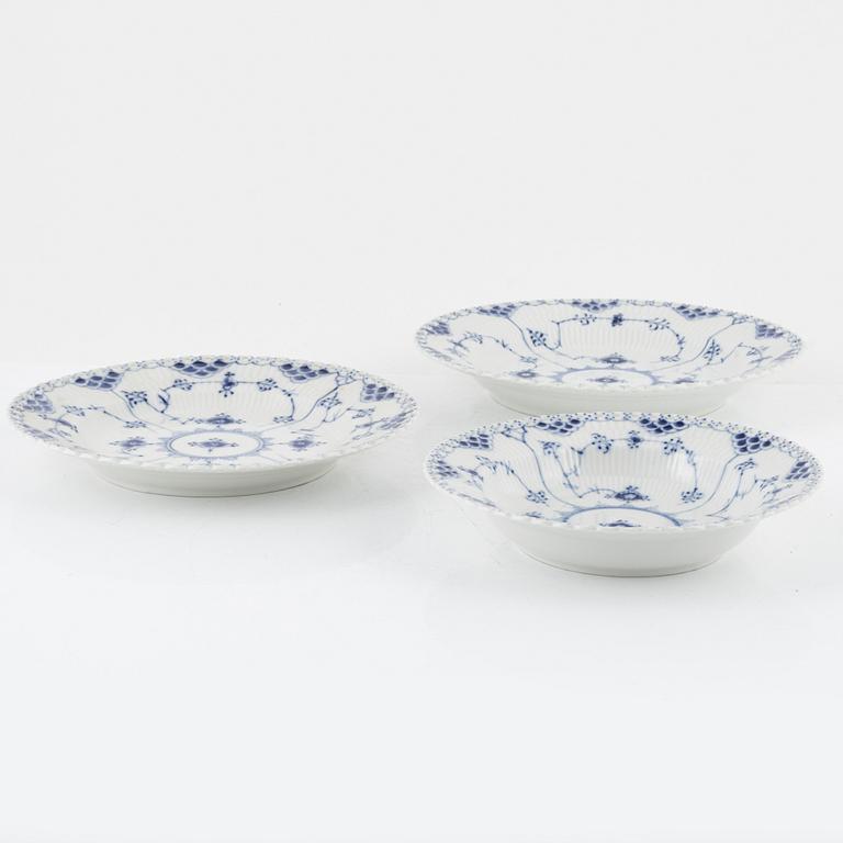 A set of nineteen porcelain plates "Musselmalet" full lace, Royal Copenhagen, Denmark.
