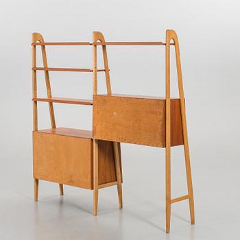 TWO TEAK AND OAK BOOKSHELVES, second half of the 20th century.