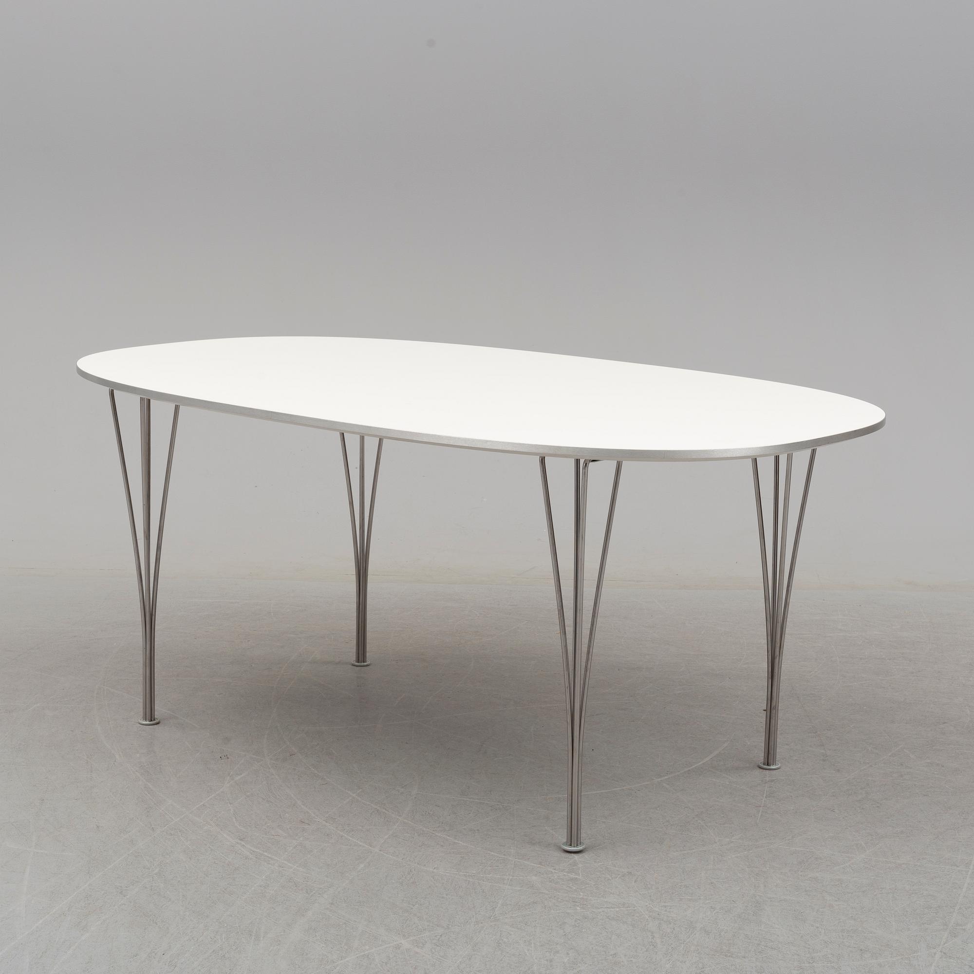 BRUNO MATHSSON & PIET HEIN, a 'Superellips' dining table from Fritz Hansen, Denmark, 2013.