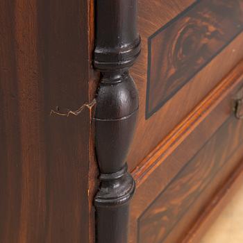 A chest of drawers, circa 1900.