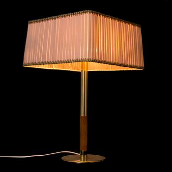 A mid 20th century '9206' table lamp for Taito Finland.