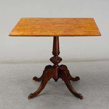 A 19th century tilt top table.