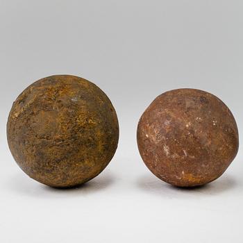 FOUR CAST IRON CANON BALLS, possibly 18th century.