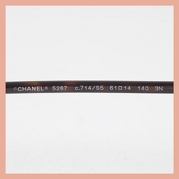 SOLGLASÖGON, Chanel.