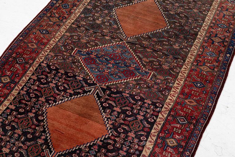 A semi-antique Bidjar rug, c. 255 x 135 cm.