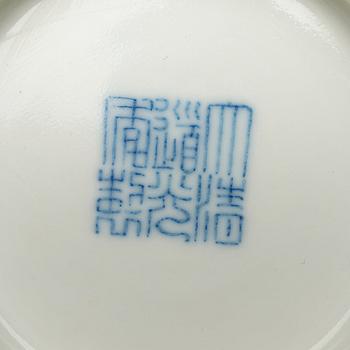 A yellow glazed bowl, Qing dynasty with Daoguang mark.