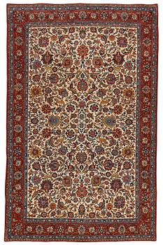 239. A CARPET, a semi-antique Qum, ca 335 x 217 cm.