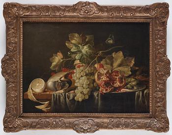 Jan Davidsz. de Heem His studio, Still life with nautilus snail, grapes, lemon and pomegranate.