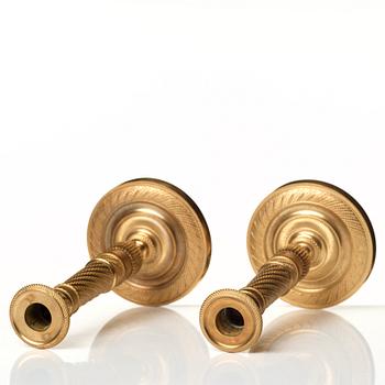 A pair of Empire candlesticks.